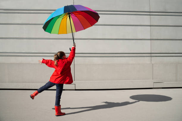 230+ Girl Flying With Umbrella Stock Photos, Pictures & Royalty-Free Images  - iStock