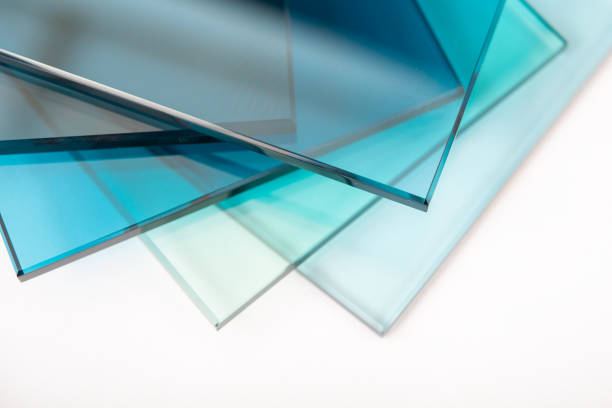 Sheets of Factory manufacturing tempered clear float glass panels cut to size stock photo