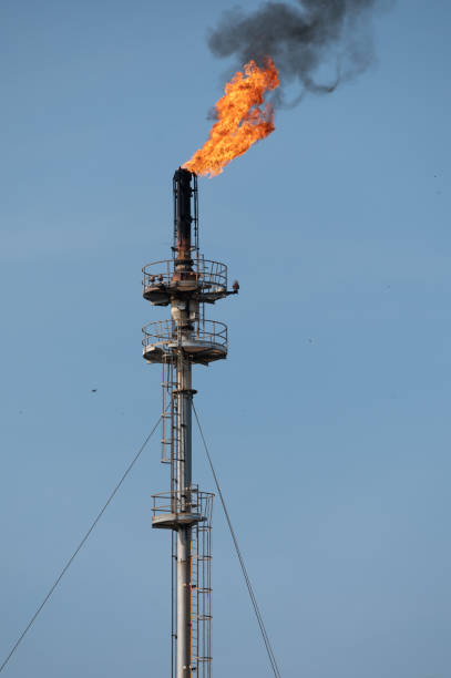 istock Smoke from Oil refinery at sunrise. environment pollution crisis concept. 1216790168