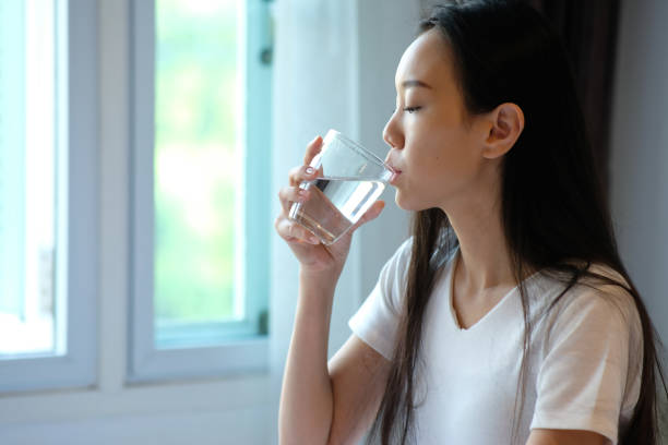 istock Woman drink a water 1216791143