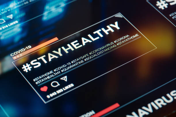 istock #stayhealthy. Stay Healthy hashtag close-up on digital display 1216791922