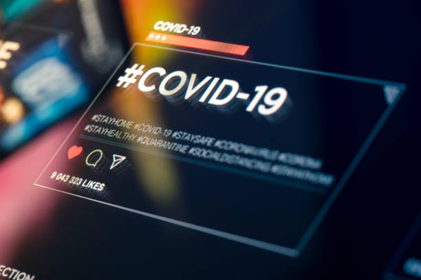 istock #COVID-19 hashtag for social networks close-up on digital display 1216793004