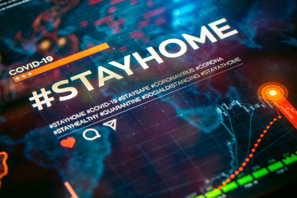 istock #stayhome. Stay home hashtag close-up on digital display 1216793055