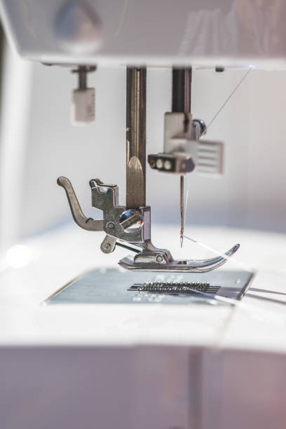 istock Sewing at home: Close up picture of sewing needle 1216793825