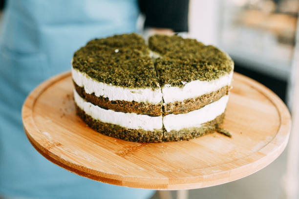 istock Layer cake with spinach and cream. Green natural spinach cake, vegan. 1216795574