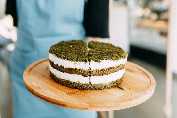 istock Layer cake with spinach and cream. Green natural spinach cake, vegan. 1216798559