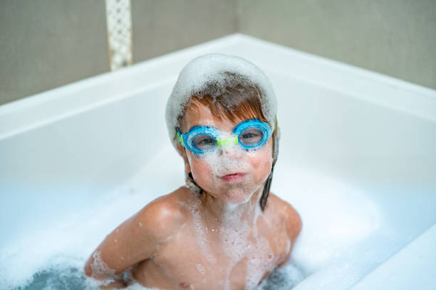 istock Cute boy bathing with goggles 1216800517