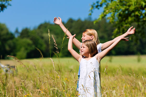 istock Happy children in a meadow 121680149