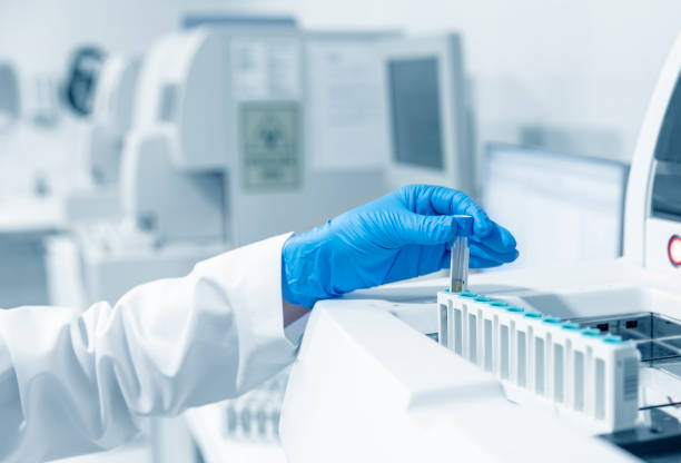 istock Female scientist analyzing covid-19 sample in the laboratory 1216801975