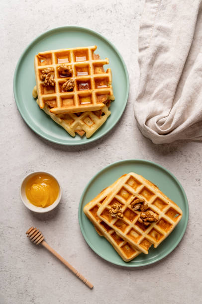 istock sweet waffles with honey top view flat lay 1216803261