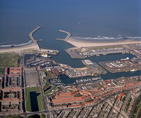 The hague,Scheveningen, Holland, October 04 - 1986: Historical aerial photo of the first harbour of Scheveningen, entrance and exit to the North Sea