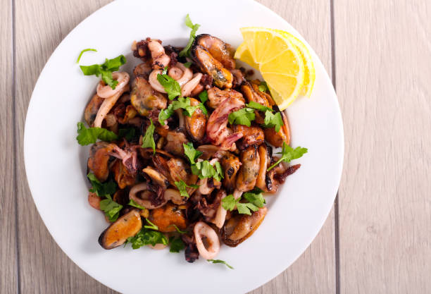 istock Seafood mix stir fry, served 1216807859