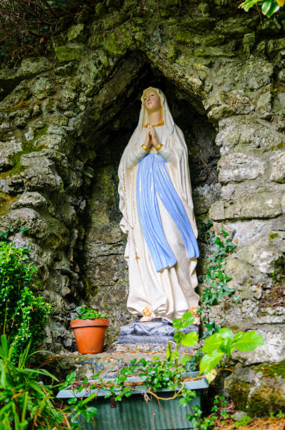 istock Virgin Mary statue at a grotto at a holy shrine 1216810281