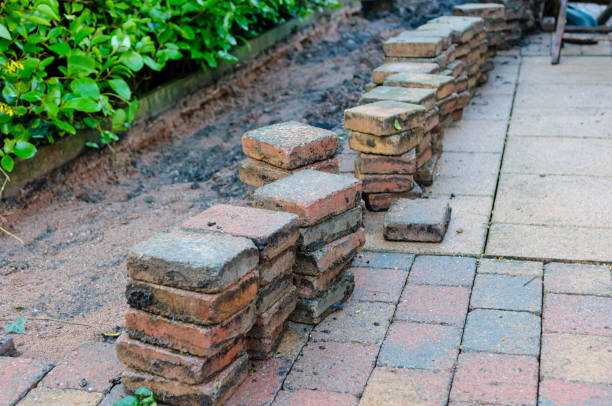 istock Patio bricks lifted to allow a repair 1216810859