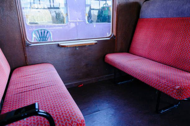 istock Seats in an old fashioned railway carriage 1216810924