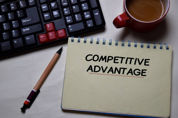istock Competitive Advantage write on a book isolated on office desk. 1216811796