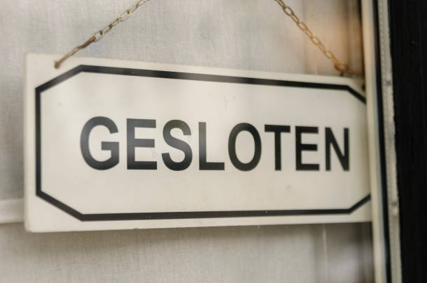 Sign on a shop door saying \