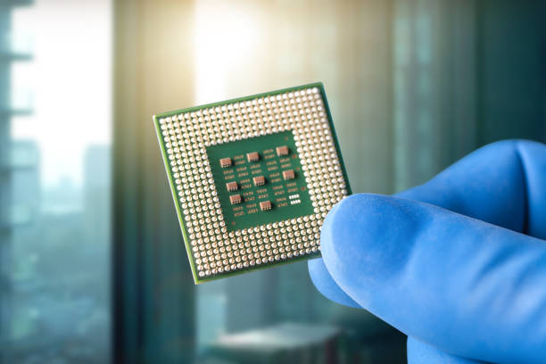 istock The hands of the scientist hold the processor 1216812469