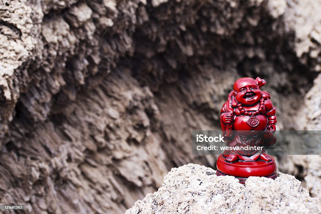 Traveling Buddha and Cave Entrance  Asia Stock Photo