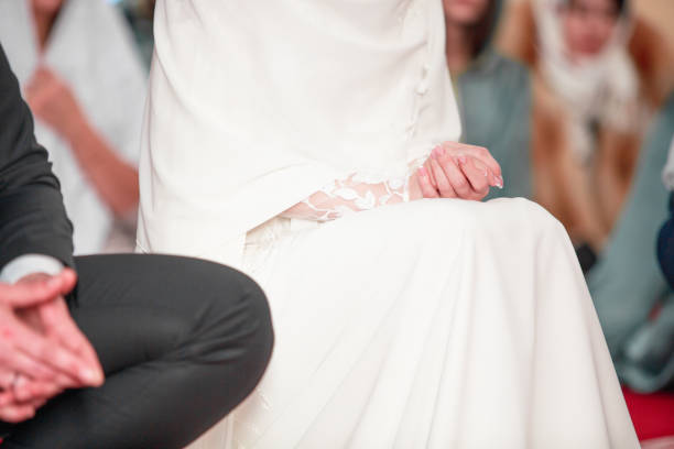 istock Praying arabian people in the mosque. Islamic wedding 1216814134