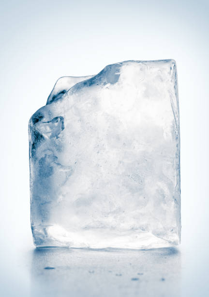 istock Block of textured clear blue ice. Clipping path included. 1216814148