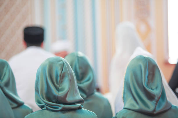 istock Praying arabian people in the mosque. Islamic wedding 1216815310