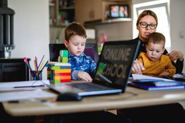istock Mother working from home with young children in quarantine isolation 1216818317