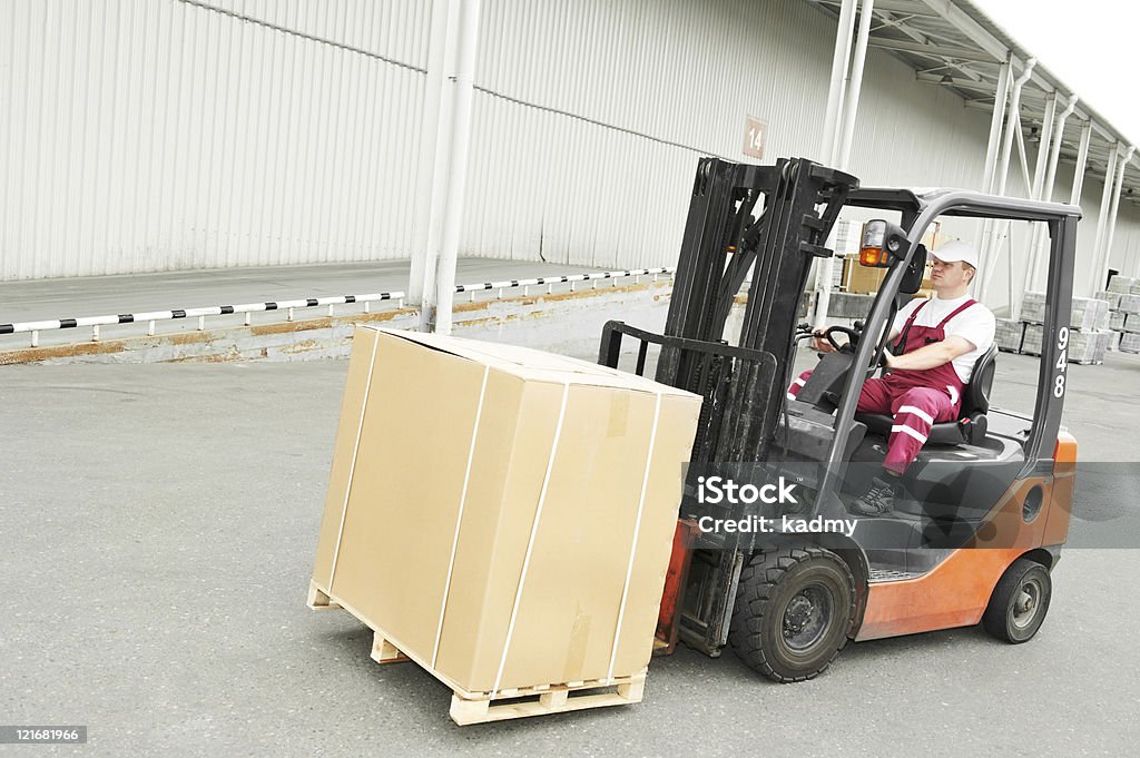 Arbeiter im Lager Gabelstapler-Fahrer - Lizenzfrei Gabelstapler Stock-Foto