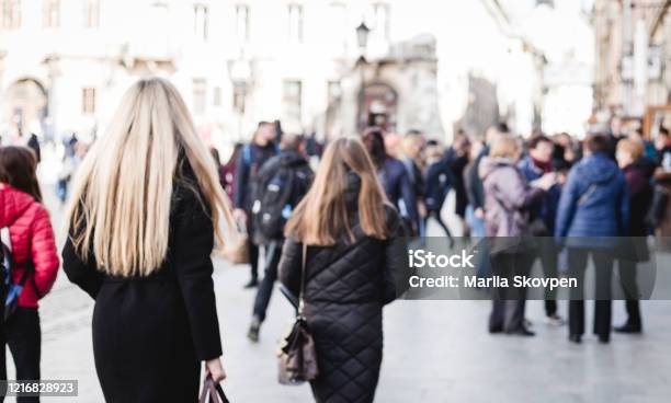 Blurred Background Blurred People Walking Through A City Street Crowd Stock Photo - Download Image Now