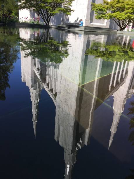 istock Reflection of Portland LDS temple in water 1216829341