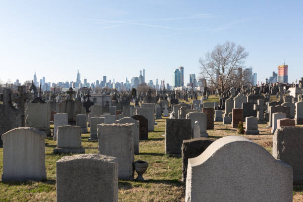 istock Cemetery in Brooklyn and NYC Skyline 1216830837