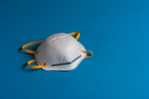 istock White face mask against air pollution. 1216832190