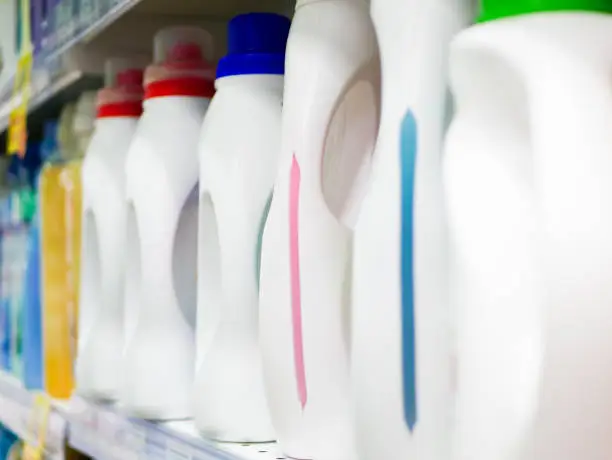 Photo of Household chemicals on the counter of the store. Side view. Products and related products in the store. home chemistry