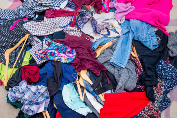 istock pile of used clothes. Second hand for recycling 1216838089