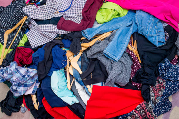 istock pile of used clothes. Second hand for recycling 1216838090