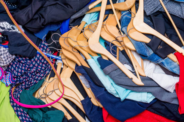 istock pile of used clothes. Second hand for recycling 1216838092
