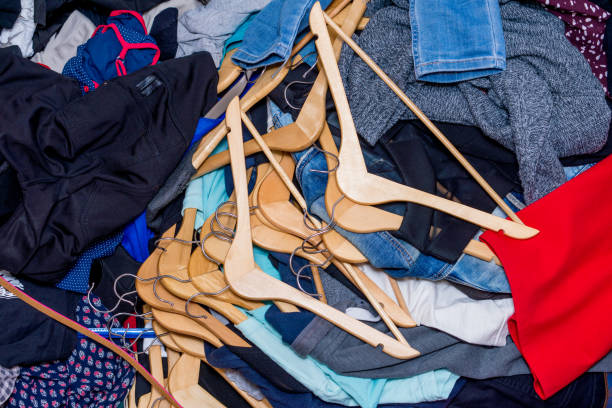 istock pile of used clothes. Second hand for recycling 1216838095