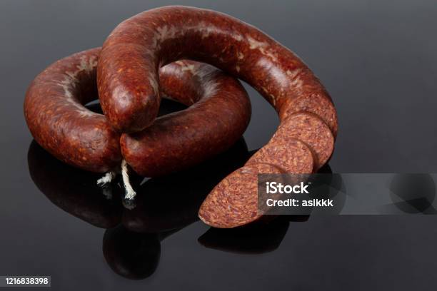 Turkish Sausage Kangal Sucuk Traditional Garlicflavored Sausage Called Sucuk Isolated On Black Background Stock Photo - Download Image Now