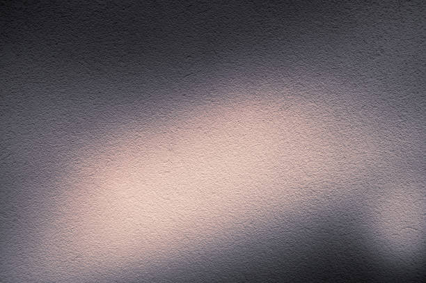 istock toned asphalt texture with glare of the sun 1216839058