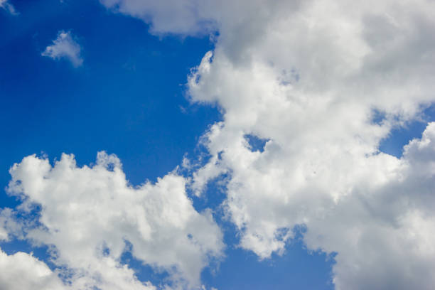 istock Blue sky and beautiful fluffy cloud. Best summer sky photo background. 1216841798