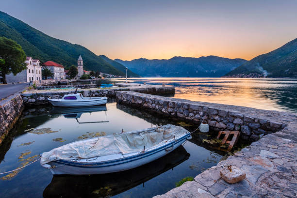 istock boats in the sea at sunset 1216844105