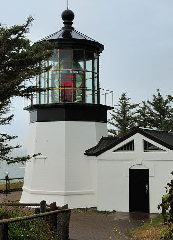 The White Lighthouse Of Cape Meares West Of Portland Oregon On A Cloudy Day