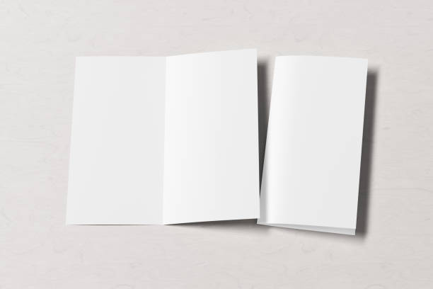 istock Blank bi-fold square leaflet cover. Bi-fold or half-fold opened and folded brochure isolated with clipping path. 1216845619
