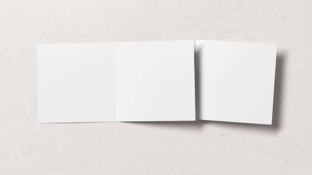 istock Blank bi-fold square pages leaflet cover. Bi-fold or half-fold opened and folded brochure isolated with clipping path. 1216845640