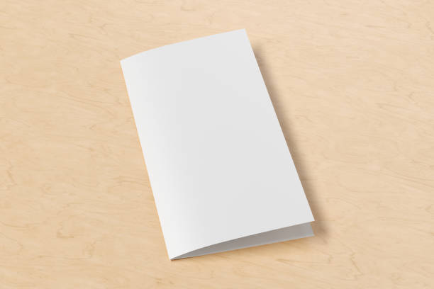istock Blank square leaflet cover. Bi-fold or half-fold brochure isolated with clipping path. 1216845702