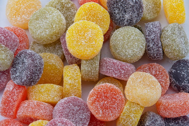 multi-coloured fruit sweets lozeng - pastilles imagens e fotografias de stock
