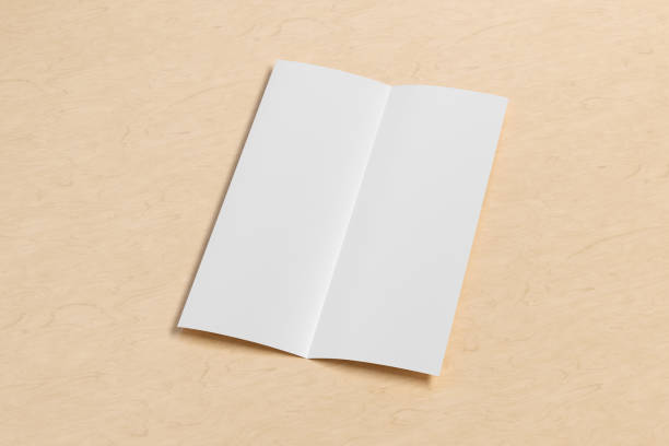 istock Blank vertical a4 leaflet cover. Bi-fold or half-fold brochure isolated with clipping path. 1216846513