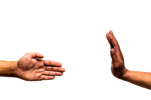 Two hands not touching on a white background with copy space. Physical distancing concept. stock photo