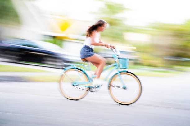 istock Cuban girl cycling motion blur 1216852910