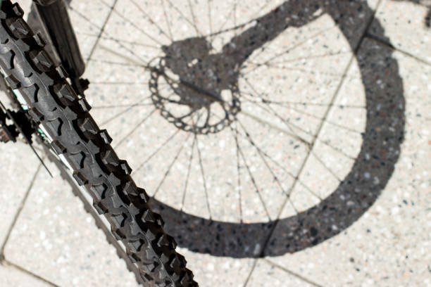 istock Bicycle wheel and tyre part grunge background 1216853451